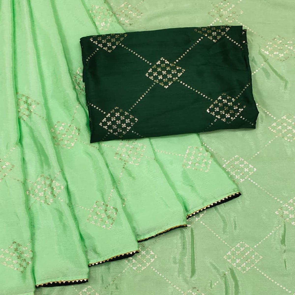 green-festive-wear-sequence-work-chiffon-saree-140229