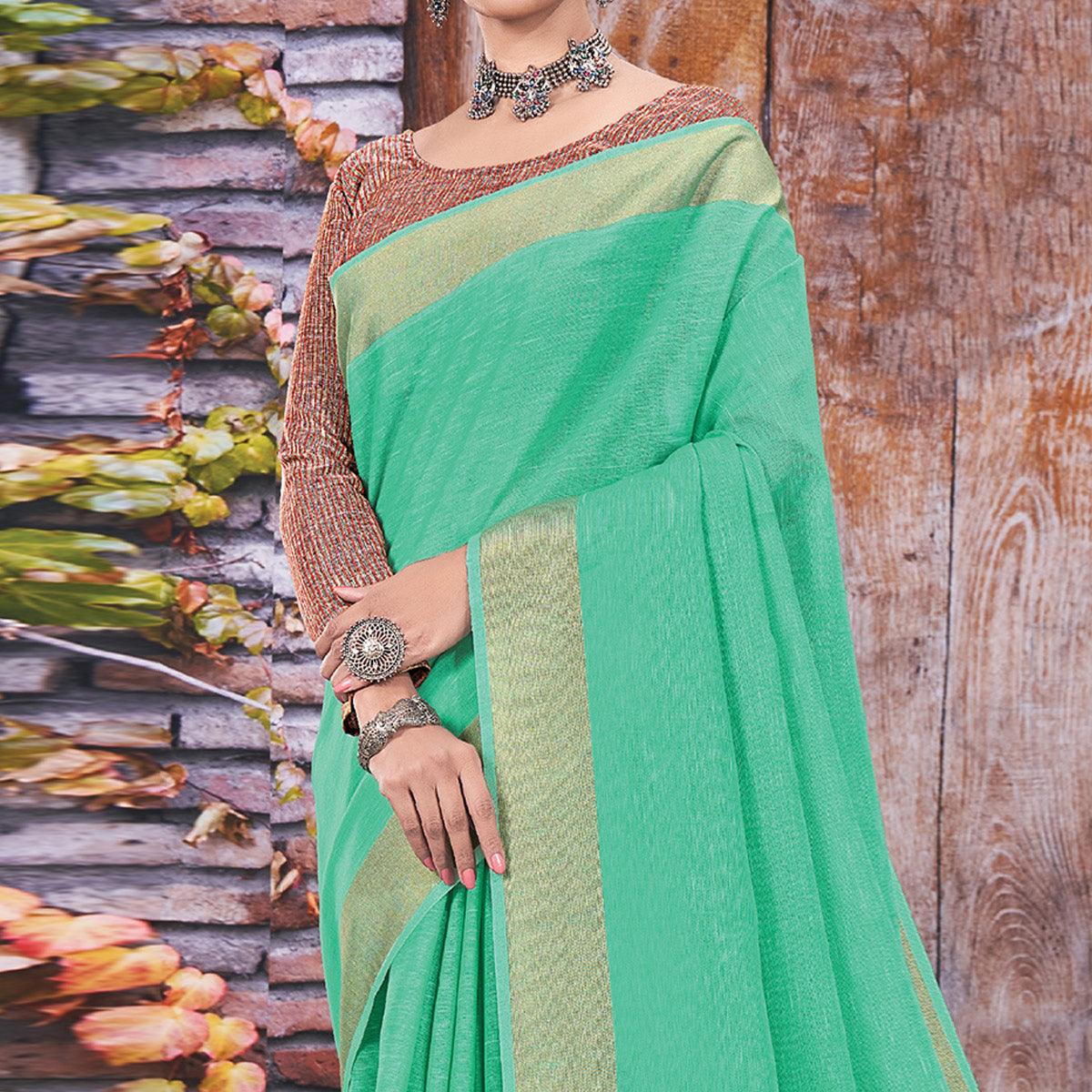 green-festive-wear-solid-linen-saree-135572