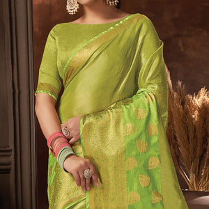 green-festive-wear-solid-organza-saree-with-tassels-142617