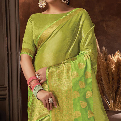 green-festive-wear-solid-organza-saree-with-tassels-142617