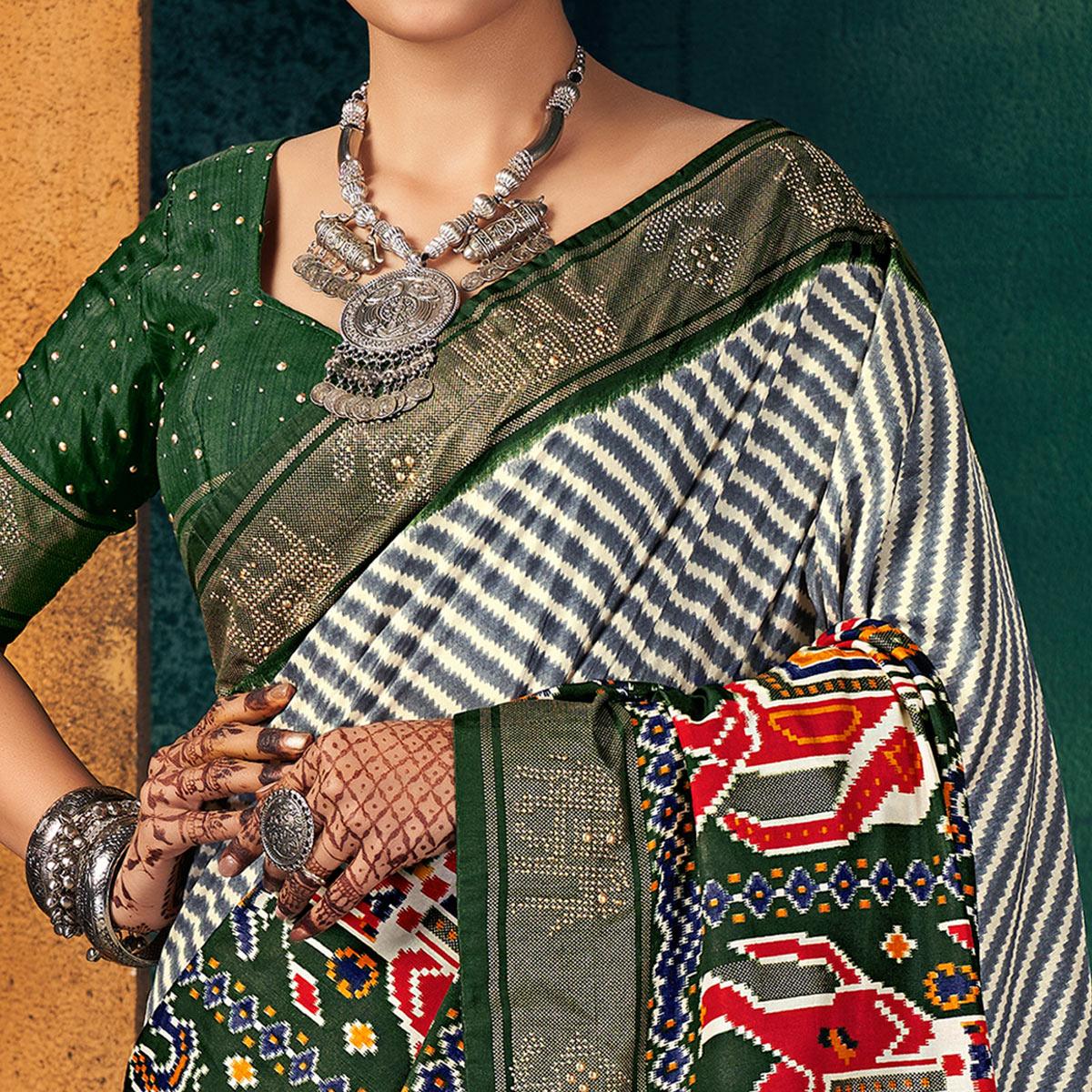 green-festive-wear-striped-printed-with-foil-border-dola-silk-saree-137645
