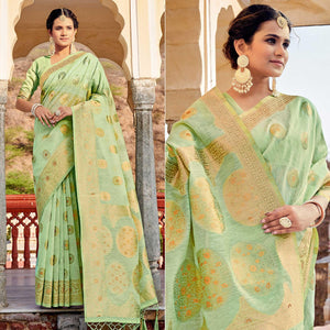 green-festive-wear-weaving-work-linen-saree-with-tassels-139515