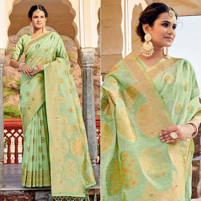 green-festive-wear-weaving-work-linen-saree-with-tassels-139515