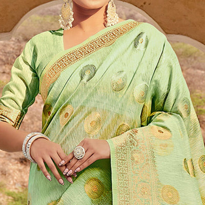 green-festive-wear-weaving-work-linen-saree-with-tassels-139515