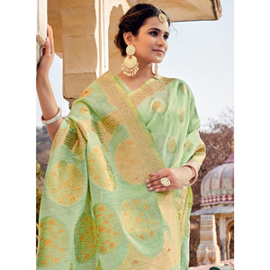 green-festive-wear-weaving-work-linen-saree-with-tassels-139515