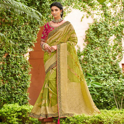 green-festive-wear-woven-embroidered-organza-saree-128556