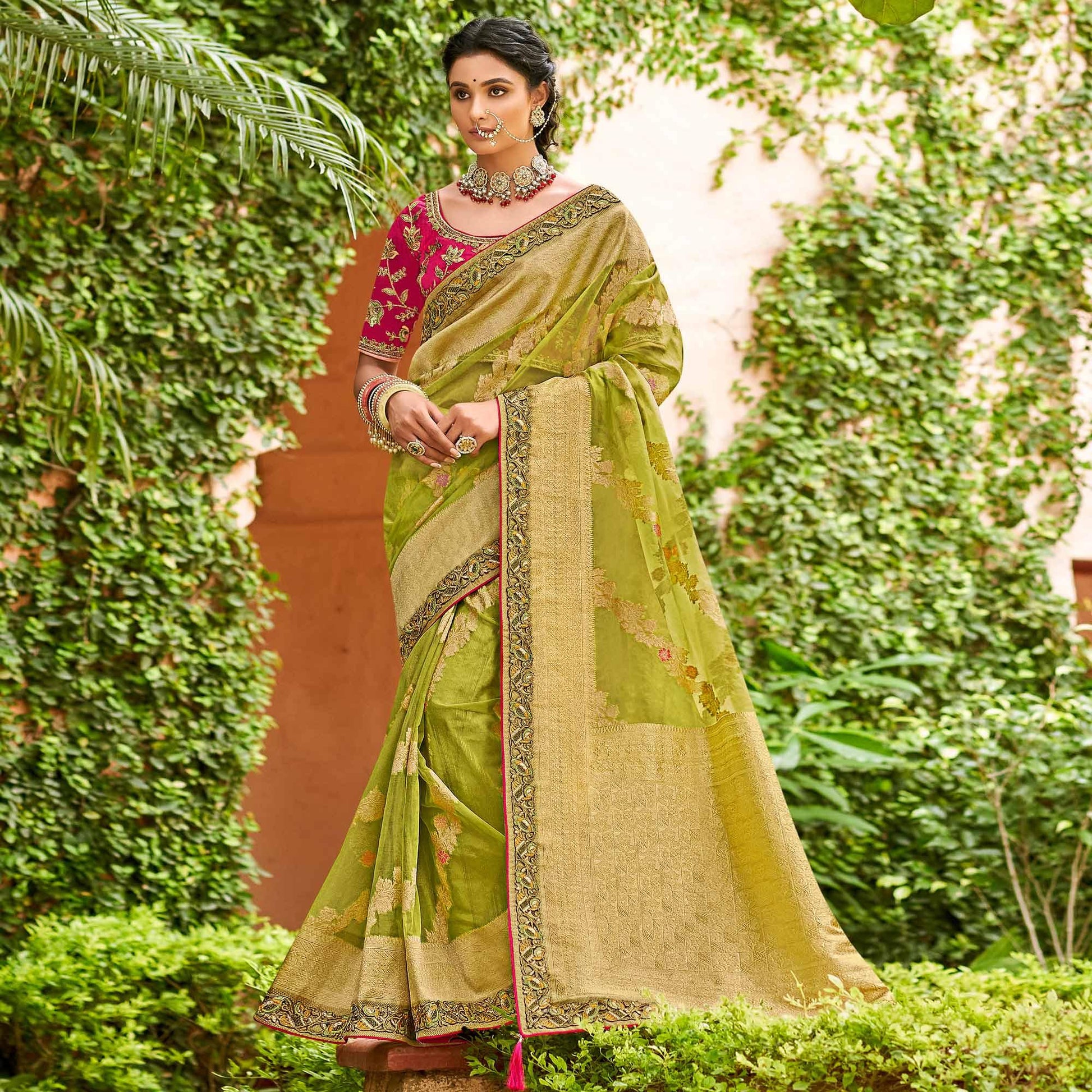 green-festive-wear-woven-embroidered-organza-saree-128556