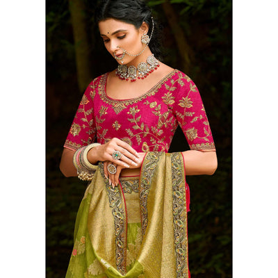 green-festive-wear-woven-embroidered-organza-saree-128556