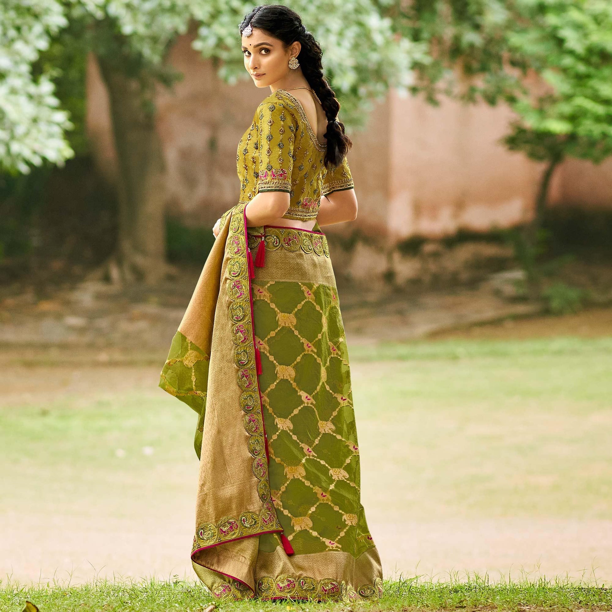 green-festive-wear-woven-embroidered-organza-saree-128559