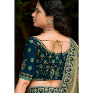 green-festive-wear-woven-embroidered-organza-saree-128554