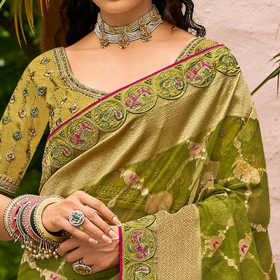 green-festive-wear-woven-embroidered-organza-saree-128559