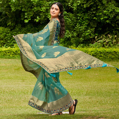 green-festive-wear-woven-embroidered-organza-saree-128554