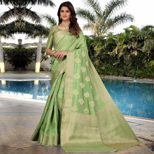green-festive-wear-woven-raw-silk-saree-133870