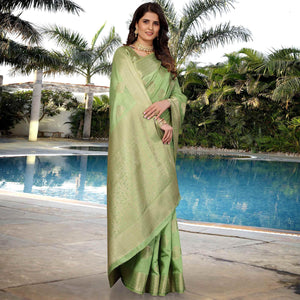 green-festive-wear-woven-raw-silk-saree-133870
