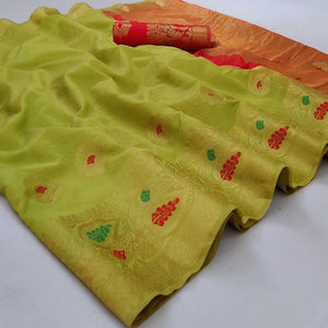 green-festive-wear-woven-banarasi-saree-with-butta-and-jacquard-border-125945