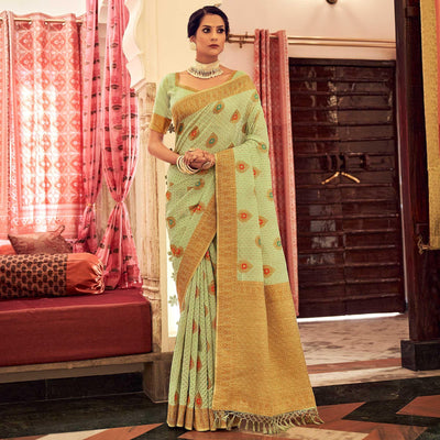 green-festive-wear-woven-banarasi-saree-with-tassels-142421