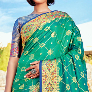 green-festive-wear-woven-banarasi-silk-saree-140437