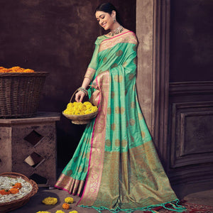 green-festive-wear-woven-banarasi-silk-saree-with-tassels-141585