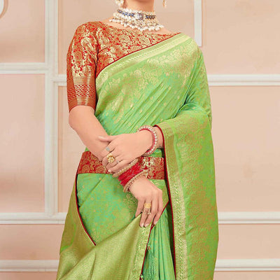 green-festive-wear-woven-banarasi-silk-saree-with-tassels-138446