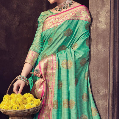 green-festive-wear-woven-banarasi-silk-saree-with-tassels-141585