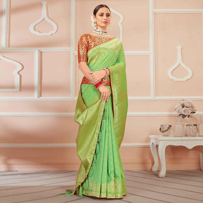 green-festive-wear-woven-banarasi-silk-saree-with-tassels-138446
