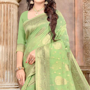 green-festive-wear-woven-chanderi-cotton-saree-129747