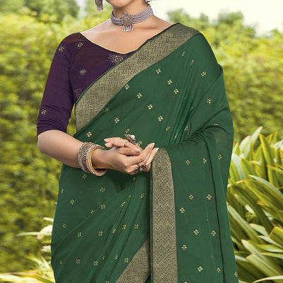 green-festive-wear-woven-chiffon-saree-139351