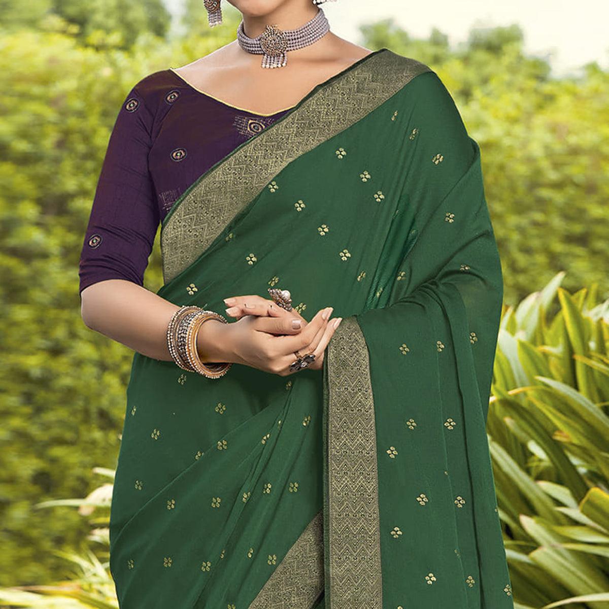 green-festive-wear-woven-chiffon-saree-139351