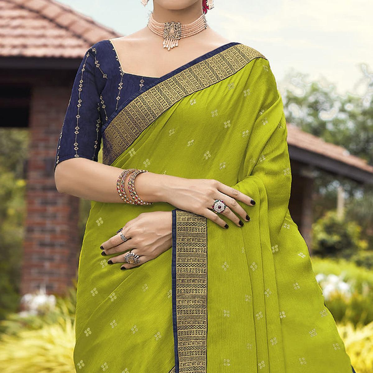 green-festive-wear-woven-chiffon-saree-139346