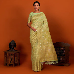 green-festive-wear-woven-cotton-saree-with-tassels-137620