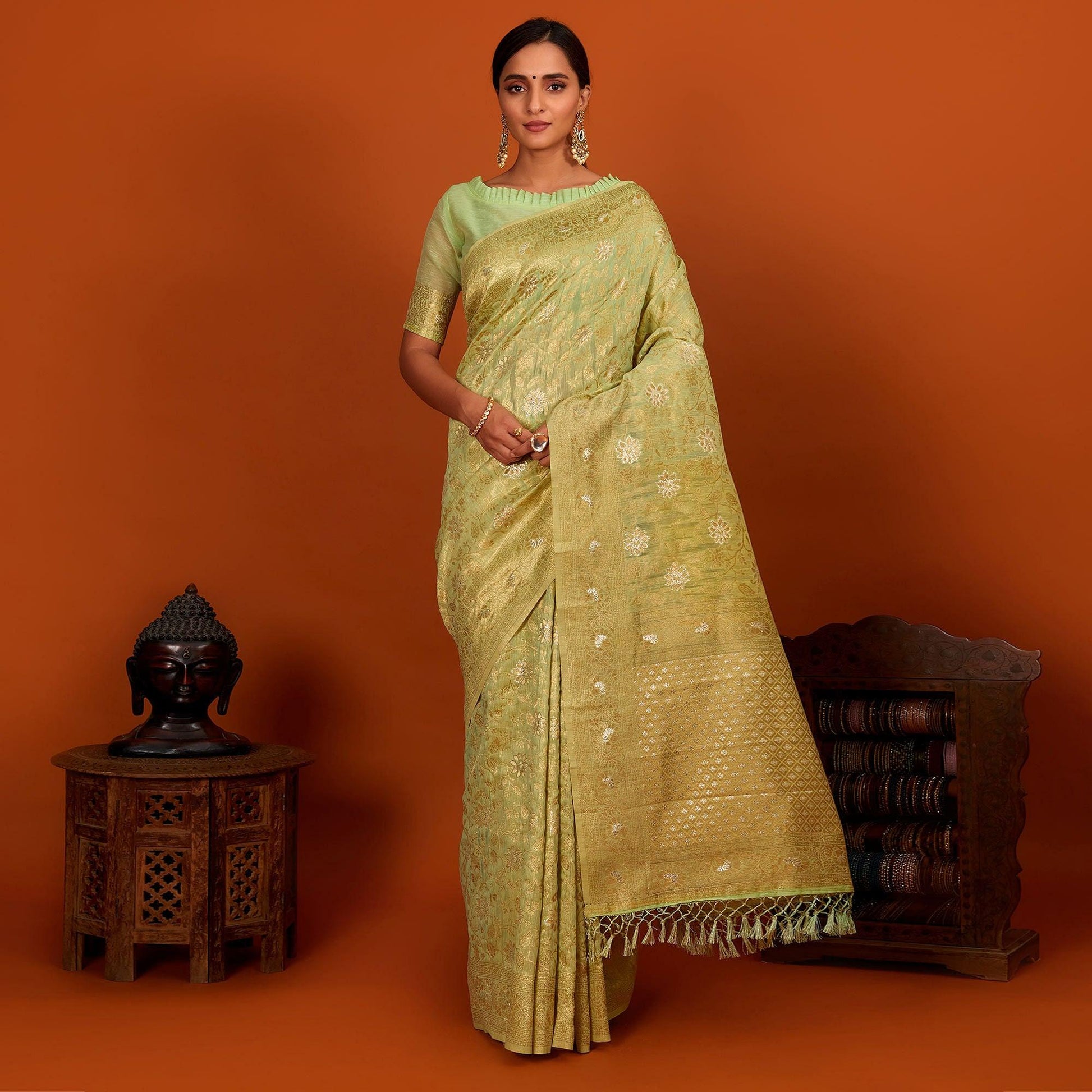 green-festive-wear-woven-cotton-saree-with-tassels-137620