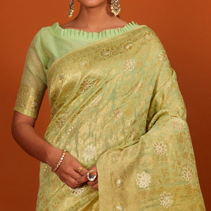 green-festive-wear-woven-cotton-saree-with-tassels-137620