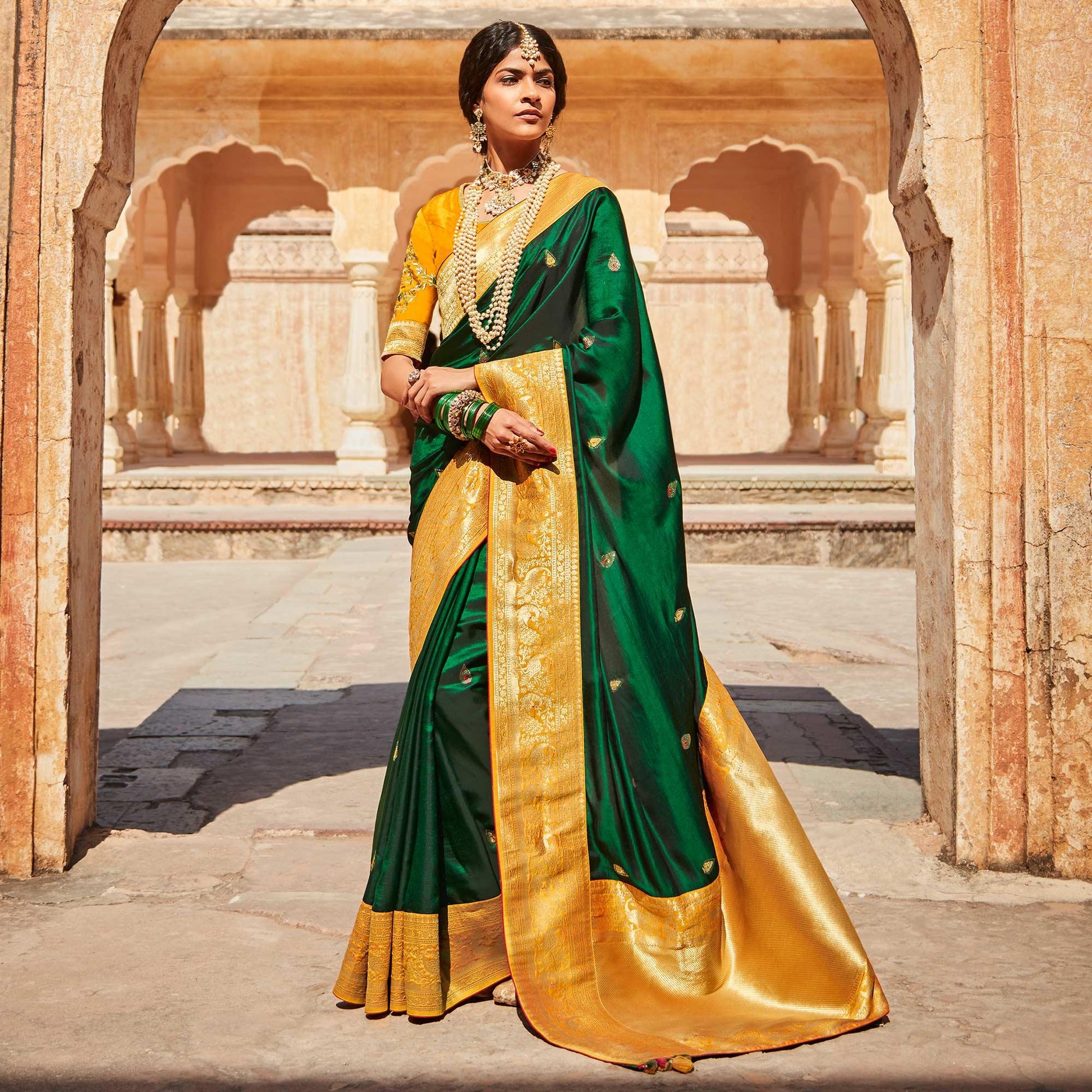green-festive-wear-woven-embroidered-silk-saree-140821