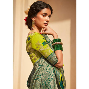 green-festive-wear-woven-embroidered-silk-saree-140825