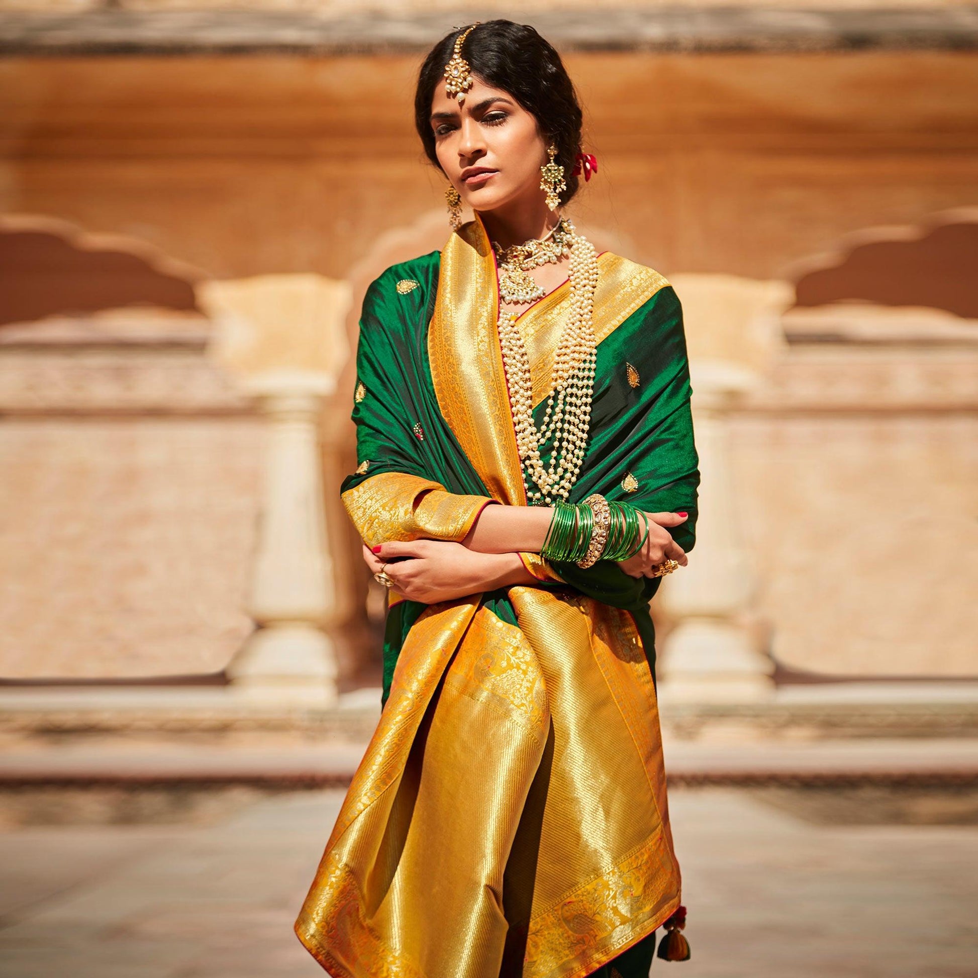 green-festive-wear-woven-embroidered-silk-saree-140821