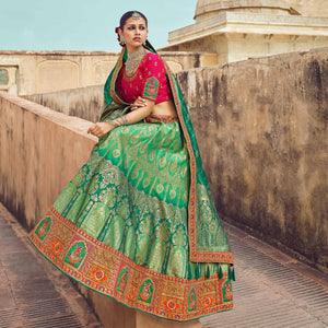green-festive-wear-woven-heavy-banarasi-silk-lehenga-choli-136871