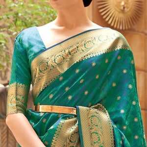 green-festive-wear-woven-pure-kanjivaram-silk-saree