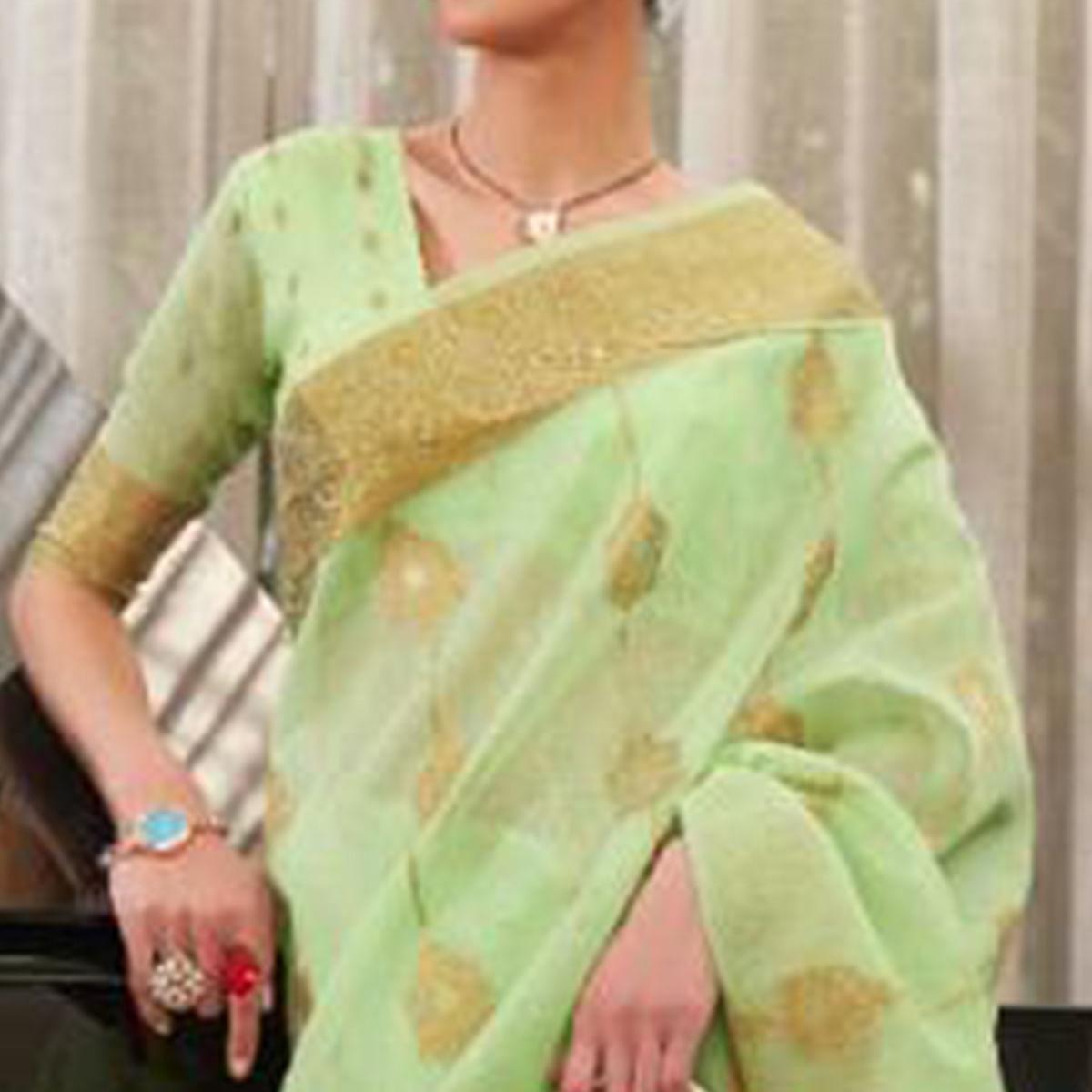 green-festive-wear-woven-linen-saree-140678