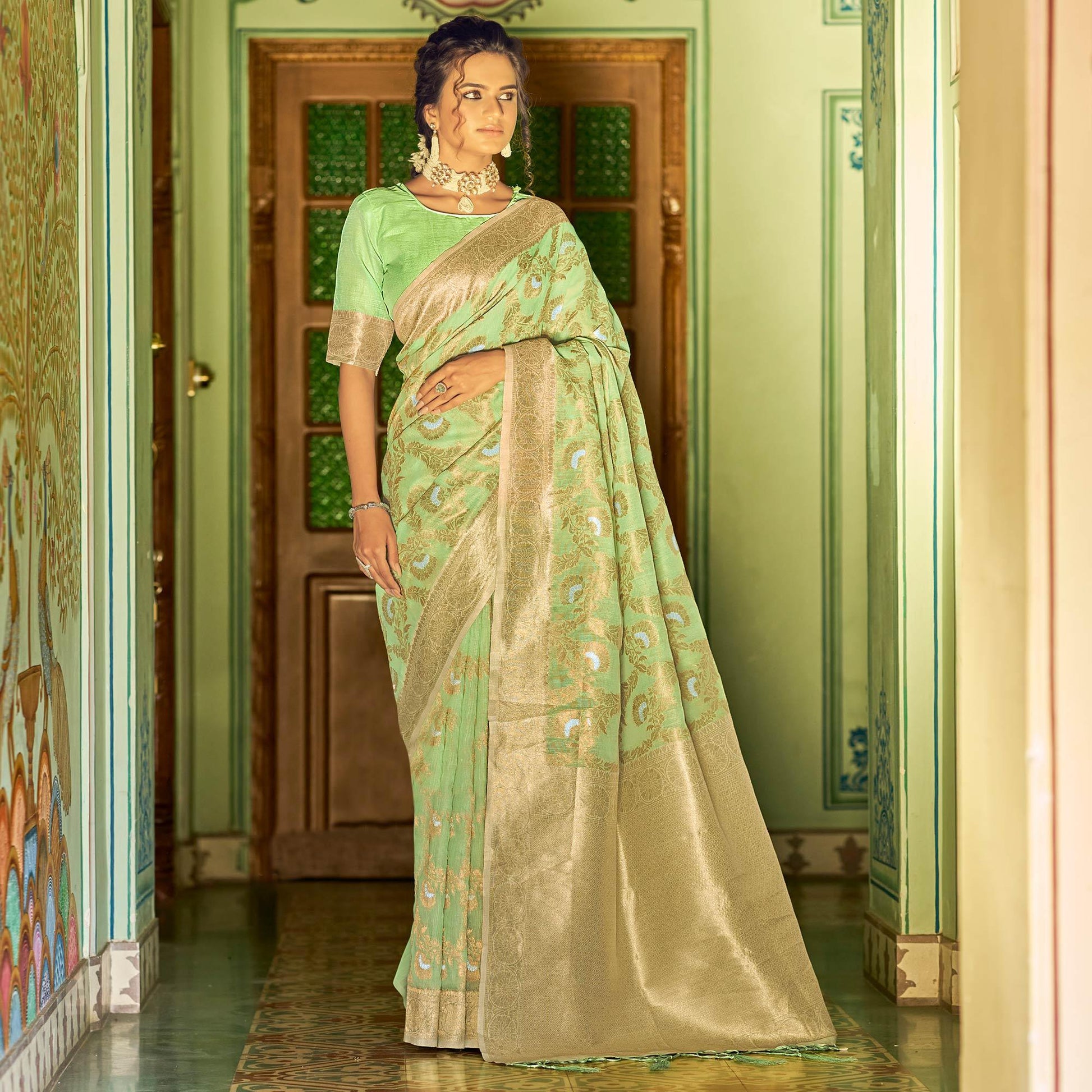 green-festive-wear-woven-linen-saree-140747