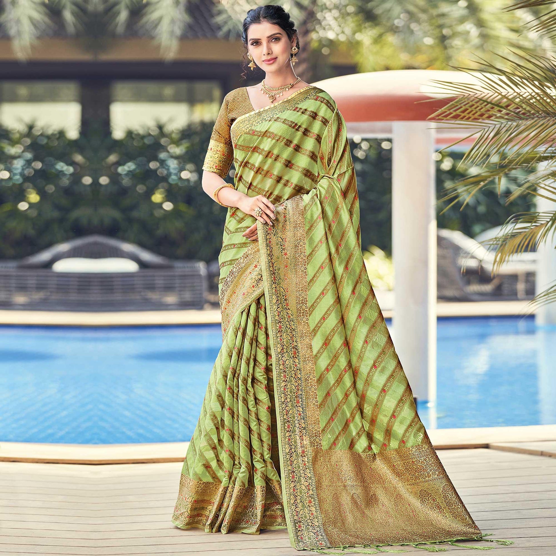 green-festive-wear-woven-organza-saree-132408