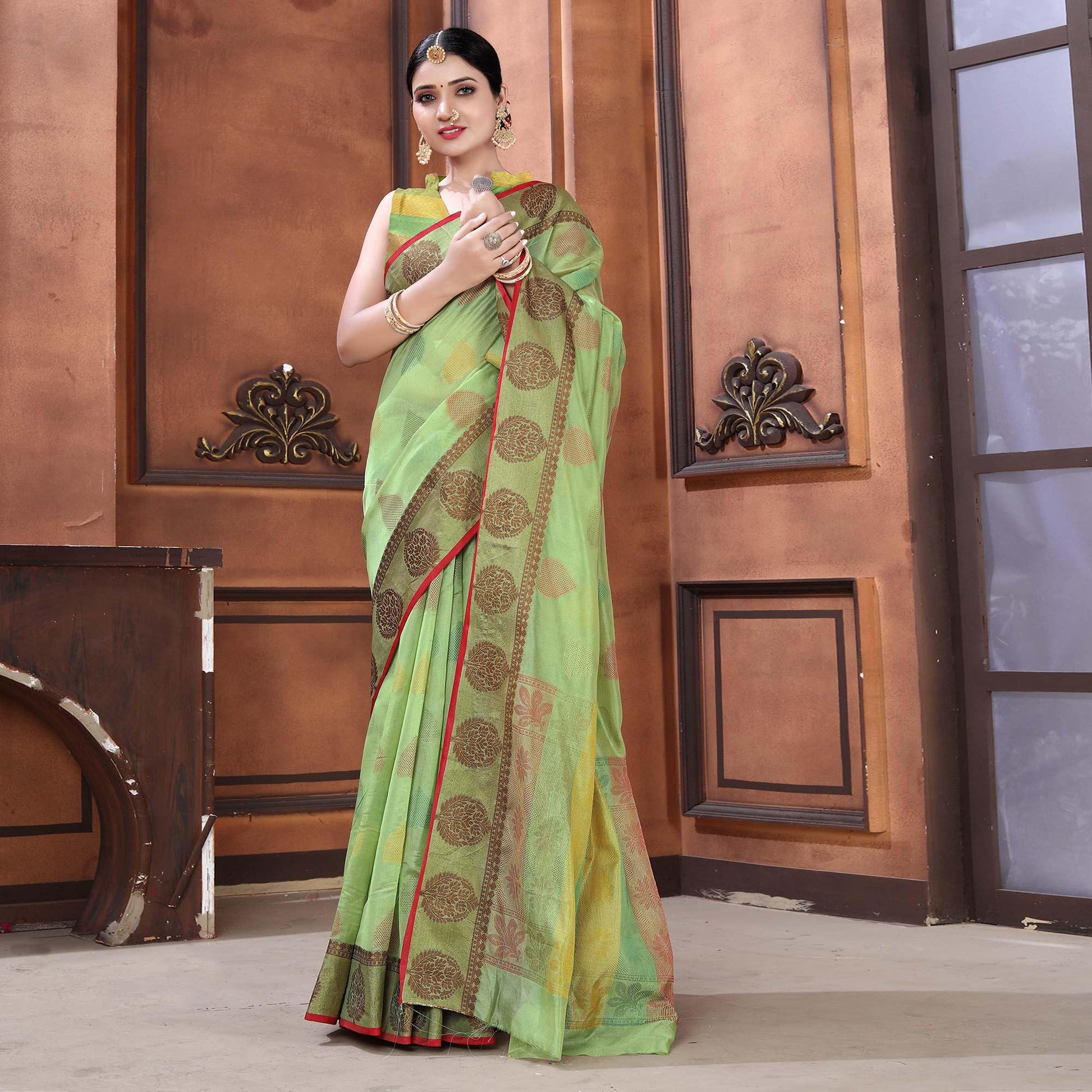 green-festive-wear-woven-organza-saree-128414