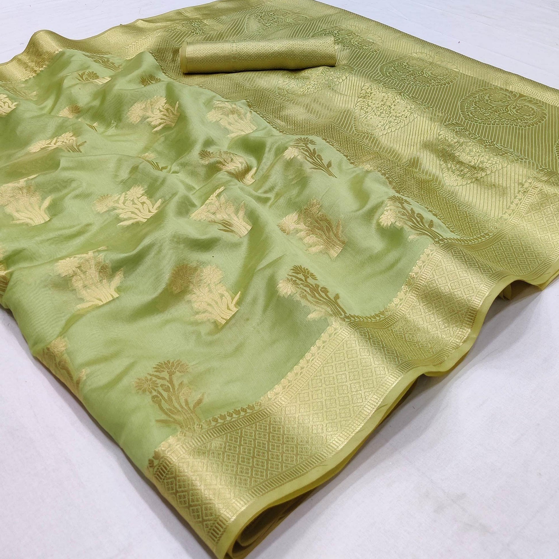 green-festive-wear-woven-organza-saree-142911