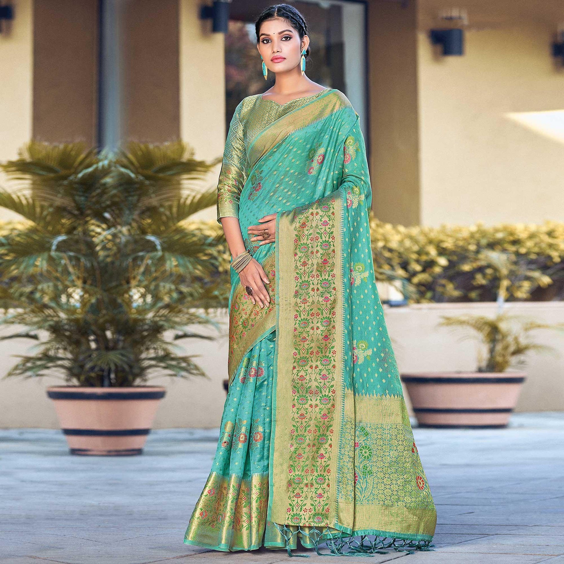 green-festive-wear-woven-organza-saree-132567