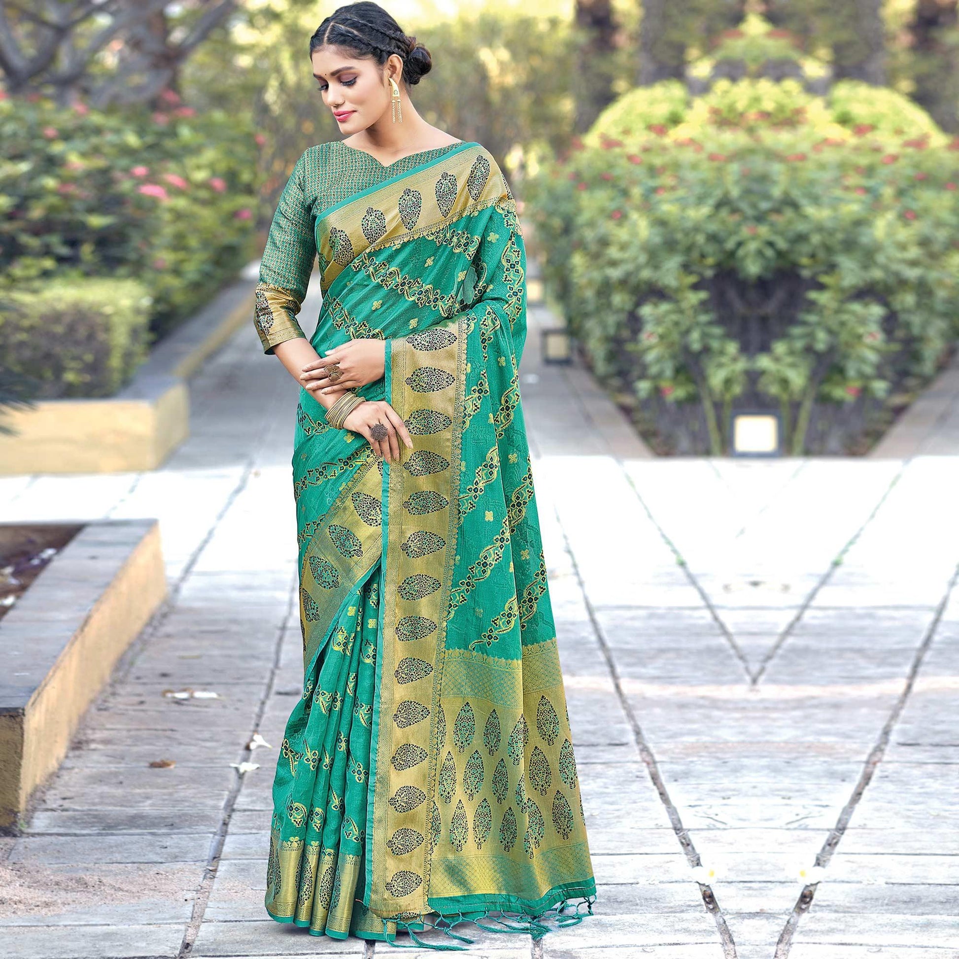 green-festive-wear-woven-organza-saree-132573