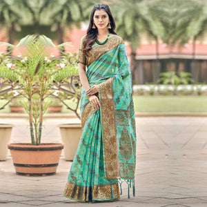 green-festive-wear-woven-organza-saree-132403