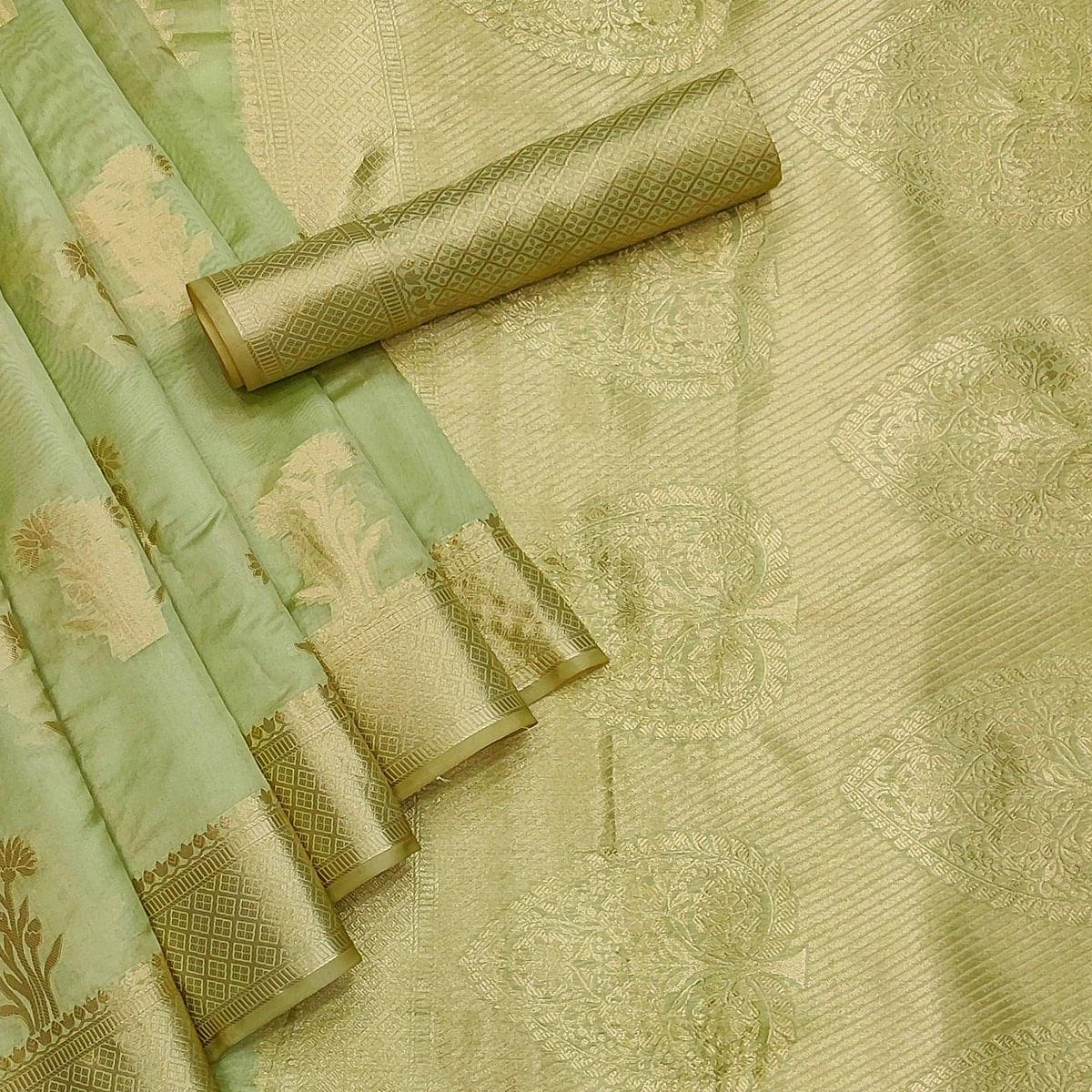 green-festive-wear-woven-organza-saree-142911