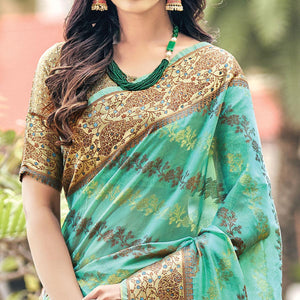 green-festive-wear-woven-organza-saree-132403