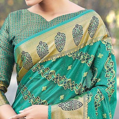 green-festive-wear-woven-organza-saree-132573