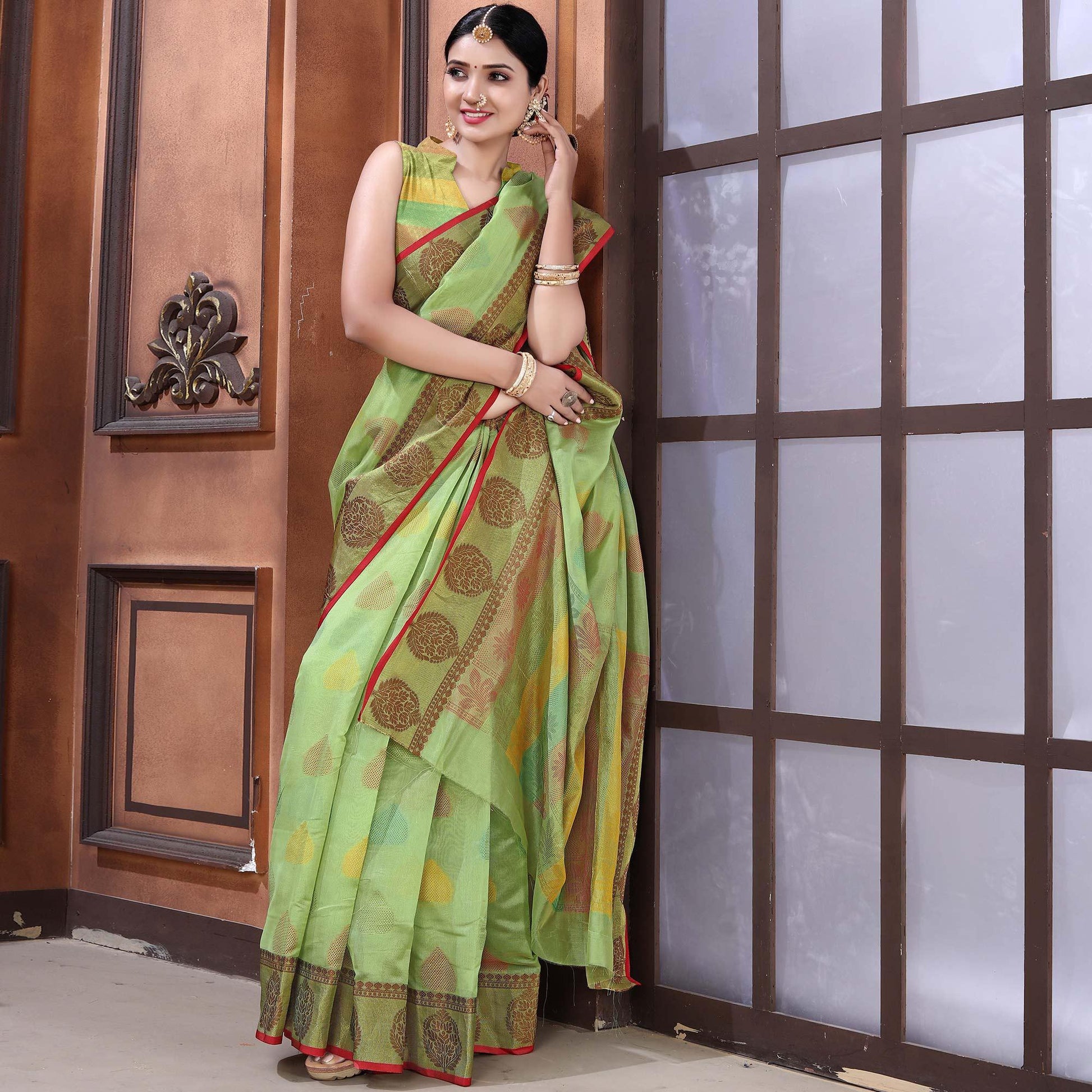 green-festive-wear-woven-organza-saree-128414