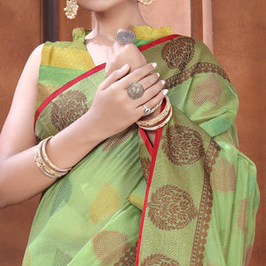 green-festive-wear-woven-organza-saree-128414
